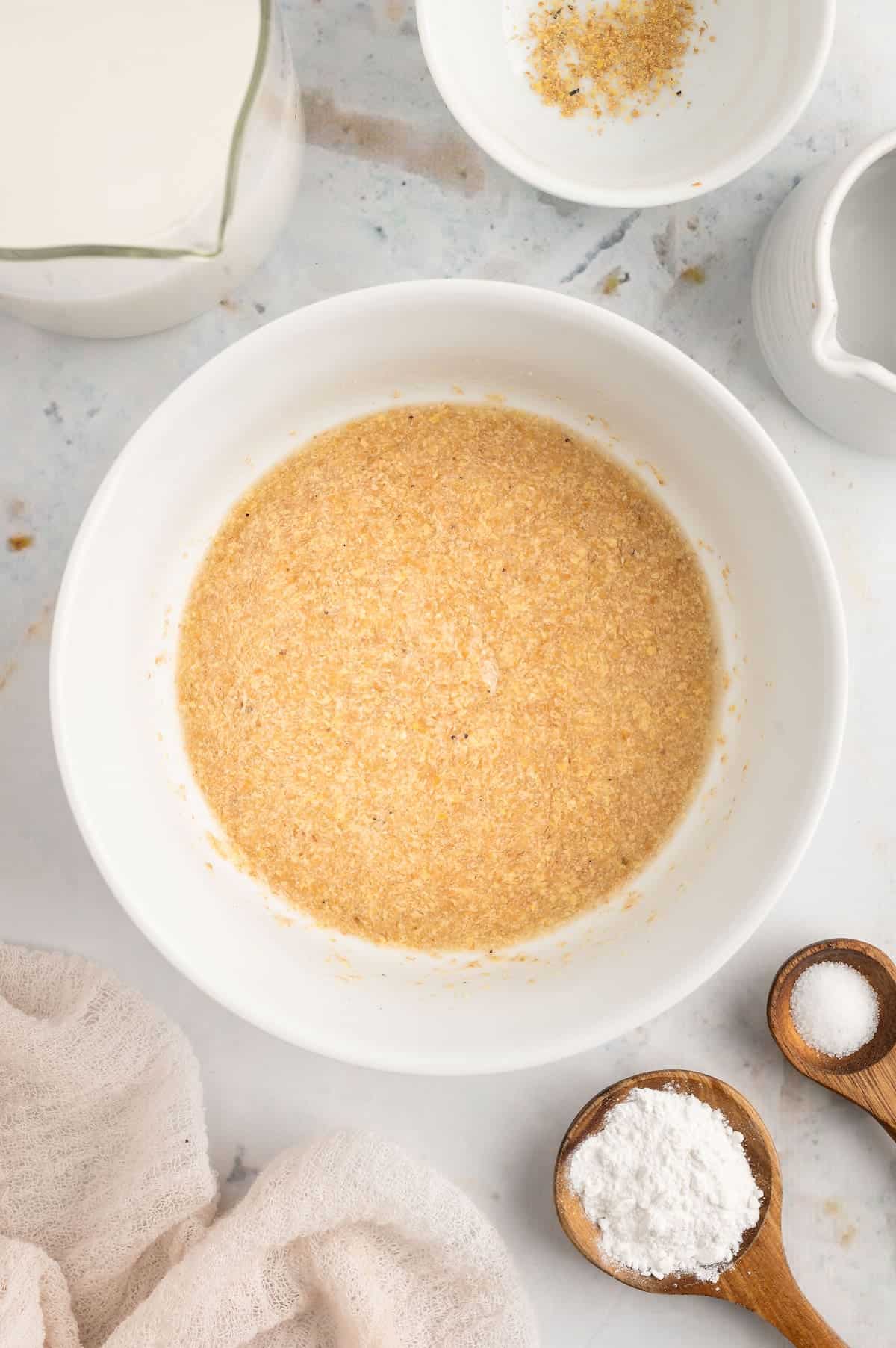 A flaxseed mixture in a white bowl.