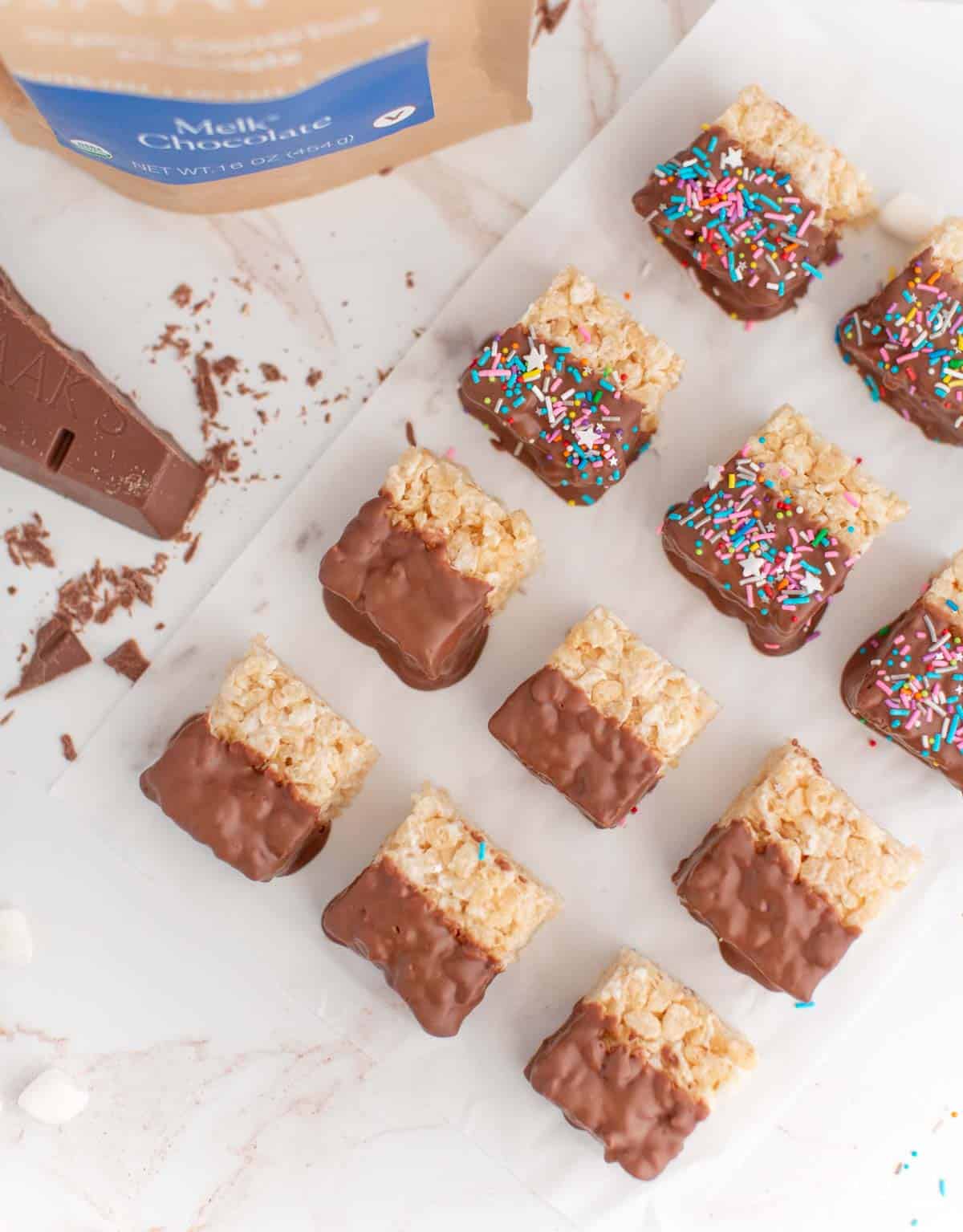 chocolate covered rice krispies treats with sjaaks dairy-free chocolate and vegan sprinkles